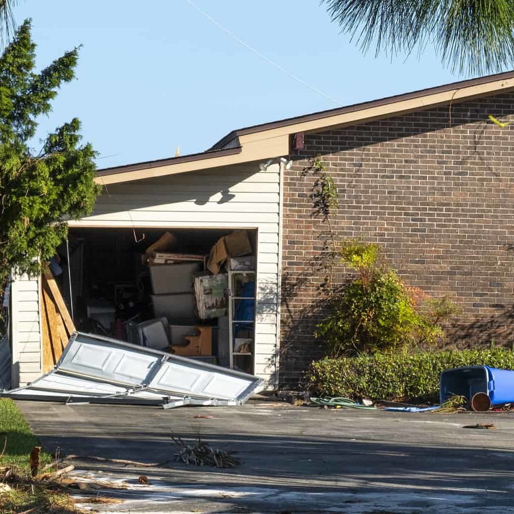 Garage Doors Assessing Garage Door Damage and Associated Roof Damage