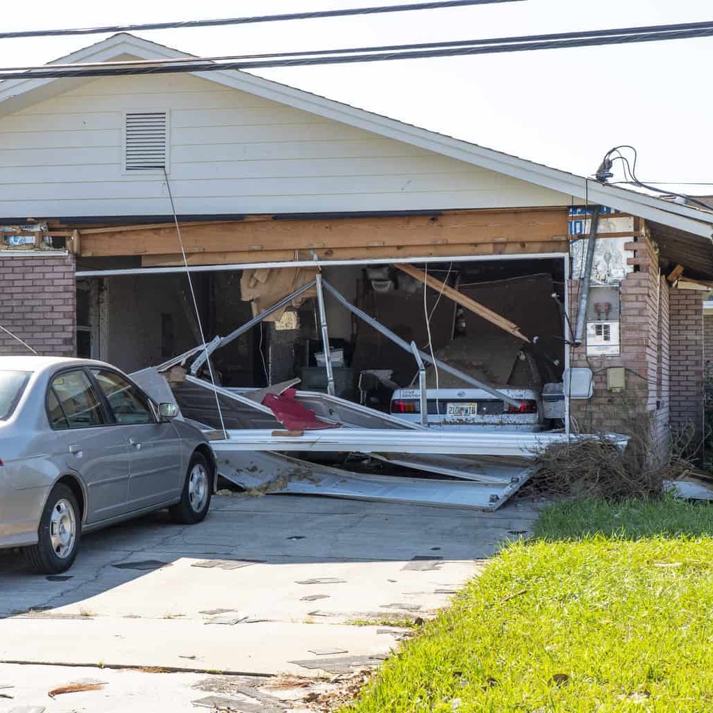 Garage Doors: Assessing Garage Door Damage and Associated Roof Damage ...