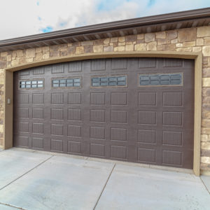 Square frame Large closed double wooden garage door day light